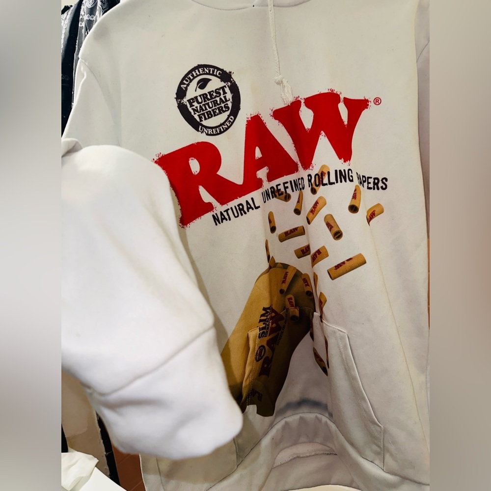 RAW NATURAL ROLLING PAPERS~ WHITE JACKET WITH THERE LOGO & DESIGN